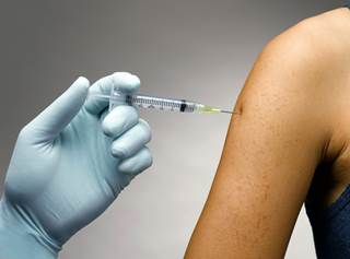 Many hospitals now require flu shots to be administered to all workers. Many hospitals now require flu shots to be administered to all workers.